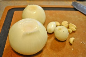 Two onions (one large, one medium), two shallots, and some garlic