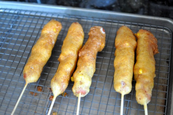 Homemade corn dogs and ketchup
