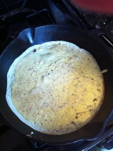 Cooking the first side of the crepe